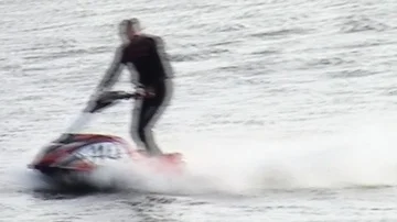 Red jetski makes waves Video stock 85572457