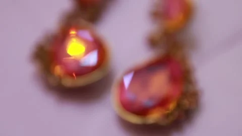 Red jewelry arranged on the table Stock Footage 162808210