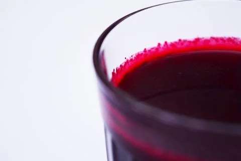 The red juice in the glass. Stock Photos