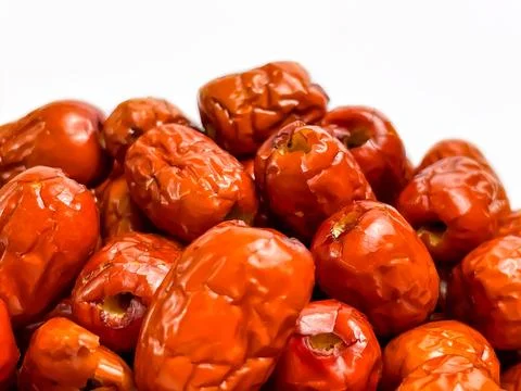 Red jujube dates close-up on a white background Stock Photos