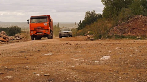 Red KAMAZ overtaking car Stock Footage 41955638