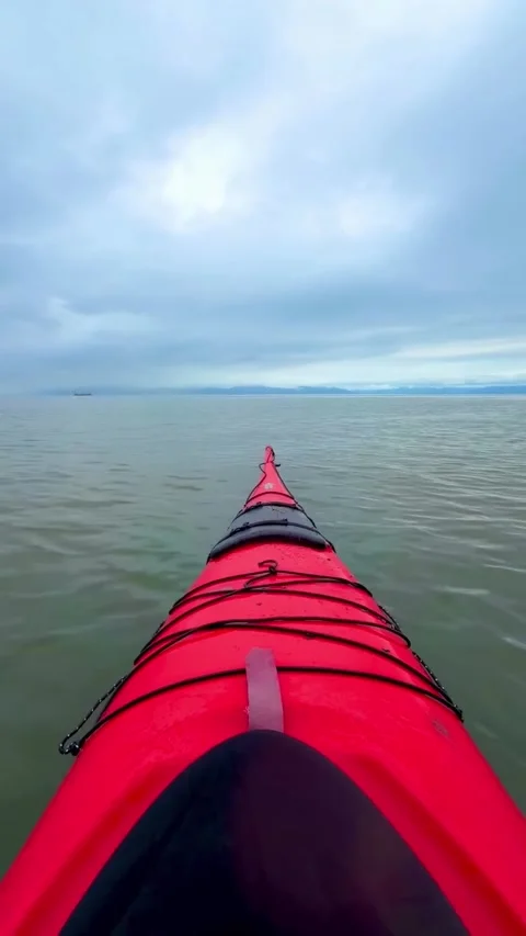 Red Kayak Floating on Calm Ocean Water Stock Footage 341133290