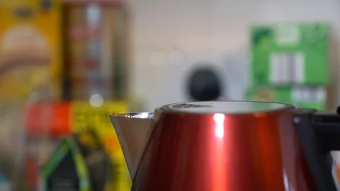 Red kettle boiling close up Video stock 85910018