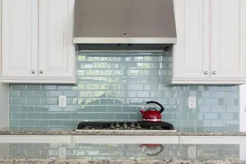 Red kettle kitchen decor Stock Photos