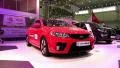 Red KIA Cerato at yearly automotive-show SIA 2012 in Kiev, Ukraine HD Footage
