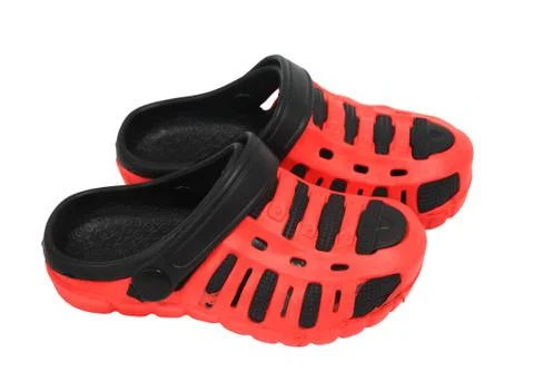 Red kid rubber sandals isolated on white background Stock Photos