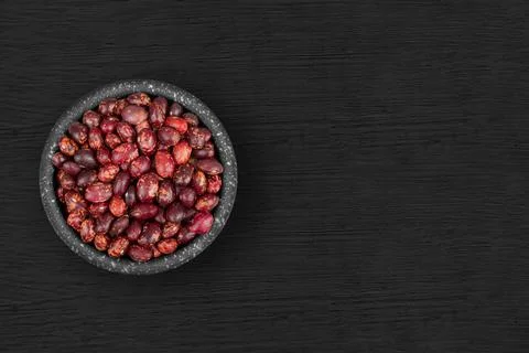 Red kidney beans inside a rustic bowl 스톡 사진