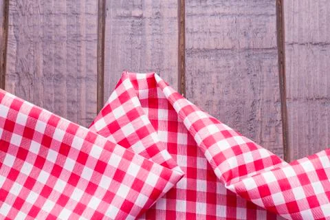 Red kitchen cloth on the table Stock Photos