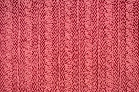 Red knitted patten fabric texture Stock Photos