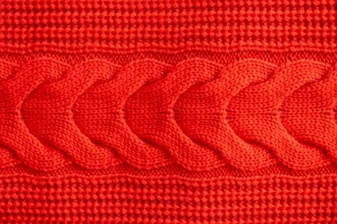 Red knitted winter sweater Background, red texture 스톡 사진