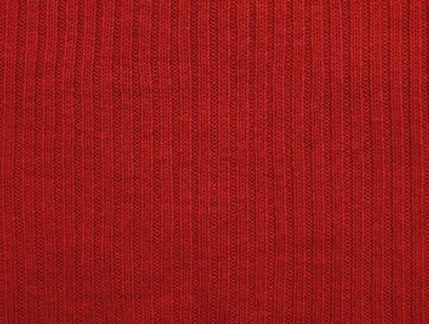 Red knitted woolen fabric texture background backdrop. Stock Photos
