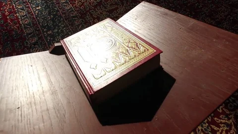 Red Koran in the Mosque on the Table. 2 Stock Footage 76246522
