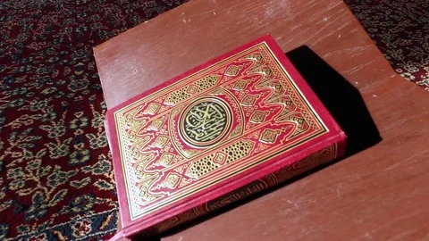 Red Koran in the Mosque on the Table. Stock Footage 76246640