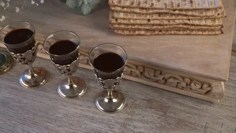 Red kosher wine four of matzah or matza Passover Haggadah Stock Footage 105478095