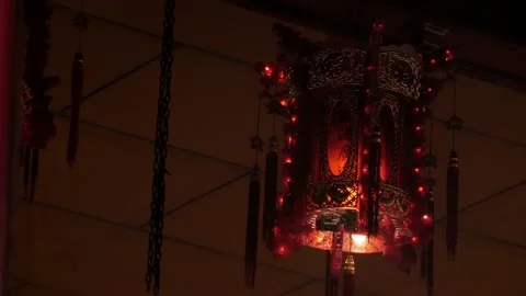 Red lamp hanging inside the temple during Chinese New Year Stock Footage 134281504