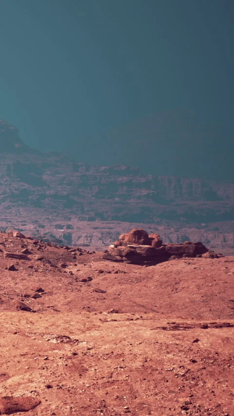 Red landscape with rocky formations on an alien planet surface in space Stock Footage 338349227