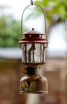 A red lantern hanging from a hook Fotos Stock