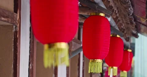 A red lantern swaying in the wind under the eaves-1 스톡 동영상 256865123
