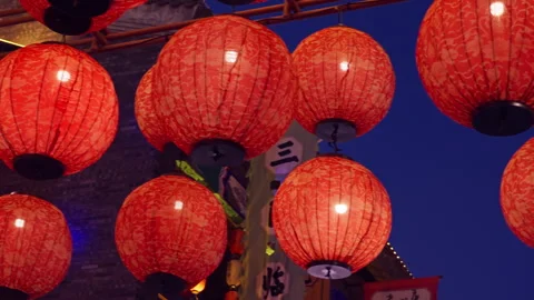 Red lanterns are hung high for the Chinese New Year Stock Footage 257862454
