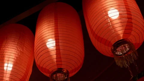 Red lanterns are hung high to welcome the Chinese New Year Stock Footage 257980417