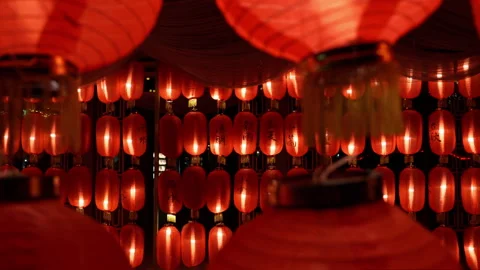 Red lanterns with blessing words are hung up to celebrate the festival Stock Footage 257912162