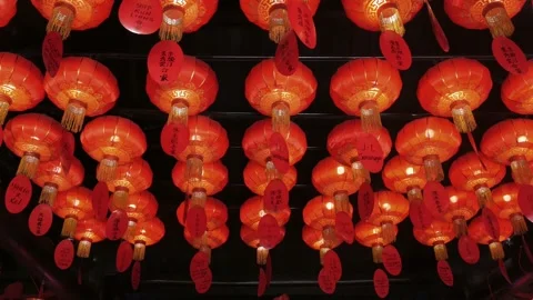 Red lanterns on a Buddhist temple's ceiling Stock Footage 148724551