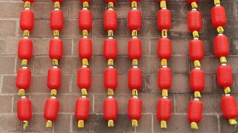 Red lanterns hanging on the wall in a Chinese ancient town Stock Footage 49512084