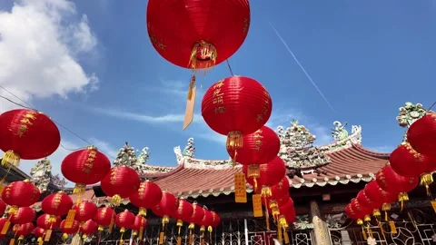 Red lanterns hanging from a wire at Goddess of Mercy Temple Stock-Footage 317307566