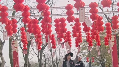 Red lanterns hung during Chinese New Year Stock Footage 170761247