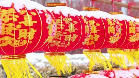 Red lanterns in the snow Stock Footage 347109073