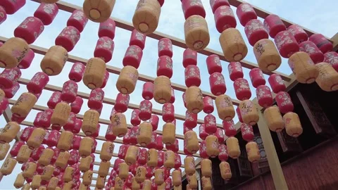 Red lanterns swaying in wind in street of  Ancient Town Stock Footage 337522628
