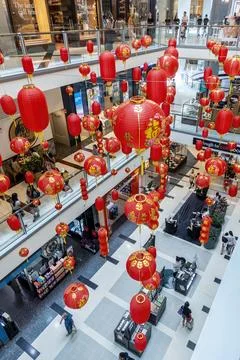 Red lanterns of various sizes and shapes hanging Stock Photos