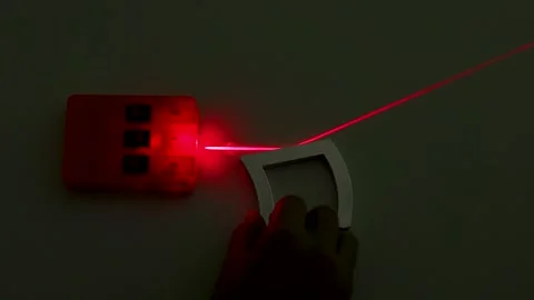 Red Laser Beam Reflection Experiment on Curved Mirror in Physics Optics Lab Stock Footage 347927876