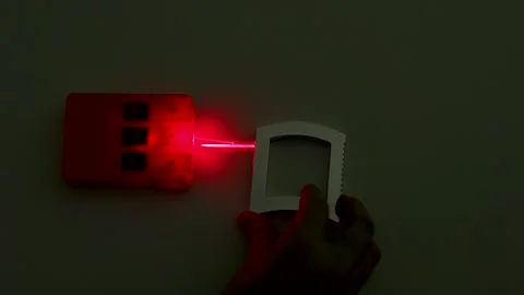 Red Laser Beam Refraction Optics Experiment in Physics Laboratory Stock Footage 347123621