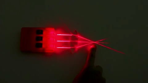 Red Laser Beam Refraction Physics Experiment with Convex Lens Stock Footage 347180136