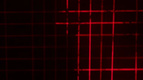 Red laser beams from stage lights create a checkered pattern in a dark studio Stock Footage 168437074