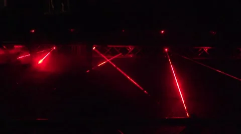 Red laser beams used in security demonstration at night. Stock Footage 61260594