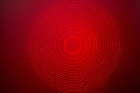 Red laser interference interference pattern of real He-Ne gas laser beam p... Stock Photos