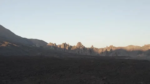Red lava rock formations in the Teide volcano Park, Tenerife, Spain, magic hour  Stock-Footage 248637559