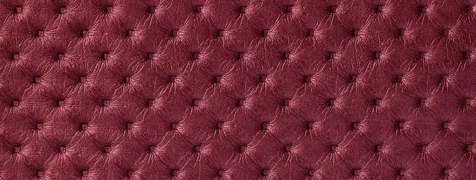 Red leather background with capitone pattern, macro. Wine textile of retro .. Stock Photos