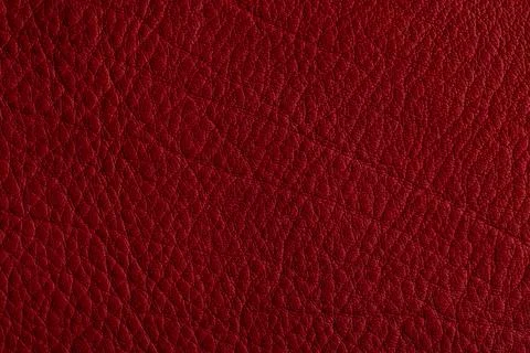 Red leather, closeup view of material texture Stock Photos
