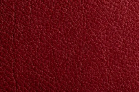 Red leather, closeup view of material texture Stock Photos