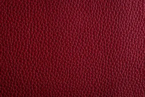 Red leather, closeup view of material texture Stock Photos