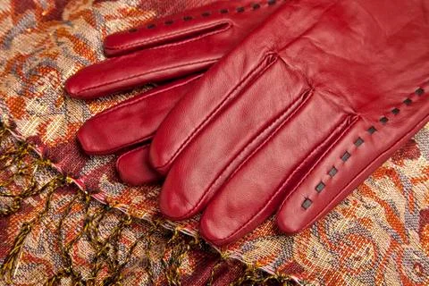Red leather gloves Stock Photos