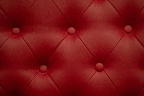 Red leather texture background with buttoned pattern Stock Photos