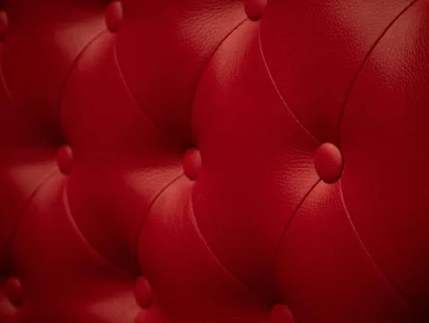 Red leather texture background with buttoned pattern Stock Photos