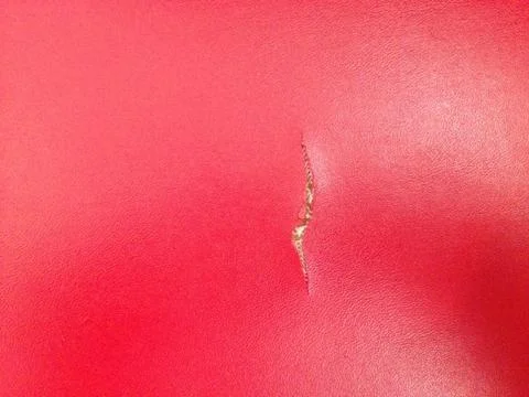 Red leather textured for background Stock Photos