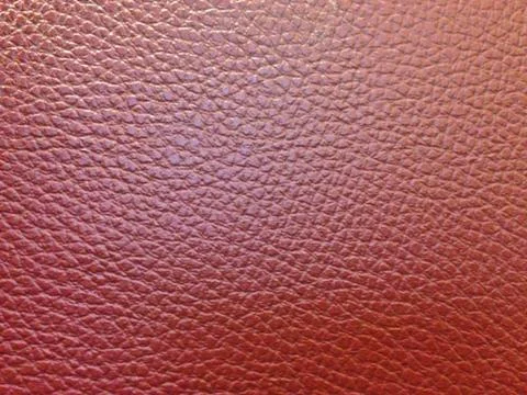 Red leather textured for background Stock Photos