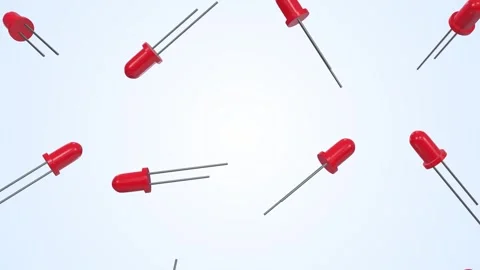 Red LED Bulbs Falling on a Light Blue Background. Light Emitting Diode. 4K Stock Footage 297612715