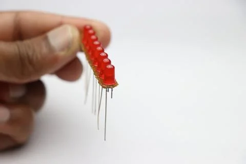 Red LED on an empty circuit board arranged in parallel circuit connection Stock Photos